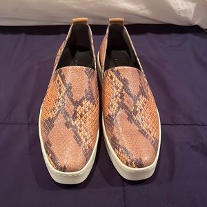 Low wedge slip on sneaker.